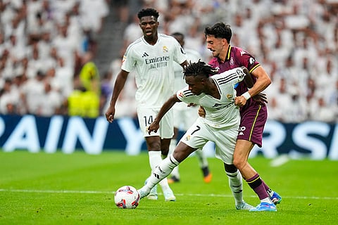 La liga 2024-25: Valladolid's Kike Perez, right, and Real Madrid's Vinicius Junior challenge for the ball